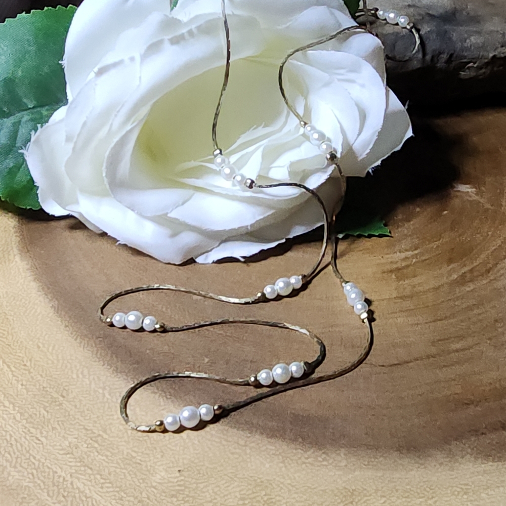 Elegant Gold Toned Necklace With Stationed White Faux Pearls